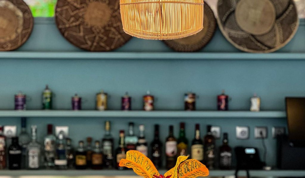 Pendant lighting above the bar area at Bom Bom Beach Resort.