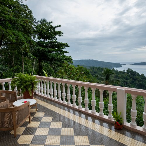 Belo Monte balustrade terrace overlooking the rainforest and ocean on Príncipe Island