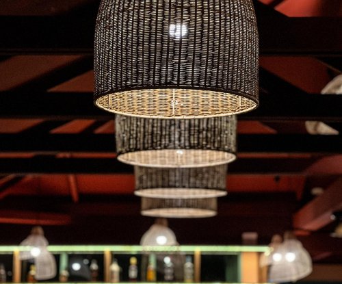 Pendant lighting above the bar area at Bom Bom Beach Resort.