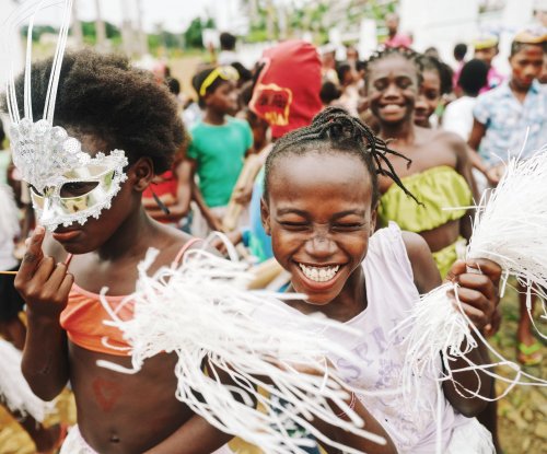 Children celebrating carnival in Príncipe