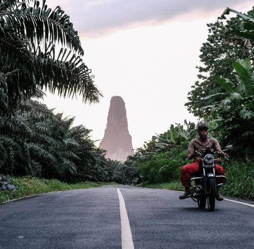 Pico Cão Grande in São Tomé surrounded by lush vegetation and mist
